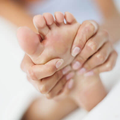massaging foot