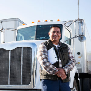 Man standing in front of truck
