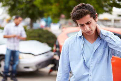 Man with sore neck from accident